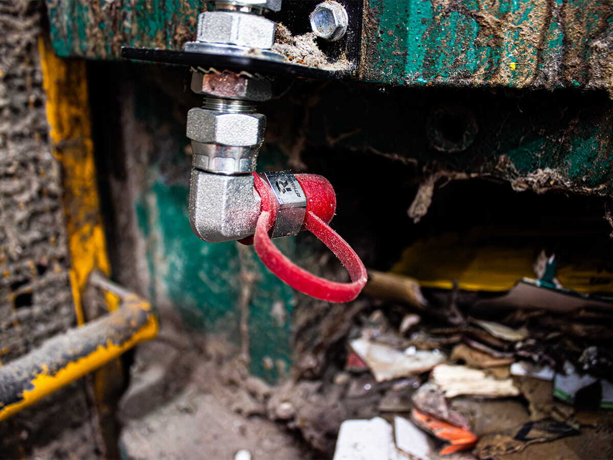 Dry powder nozzle bale wrapper