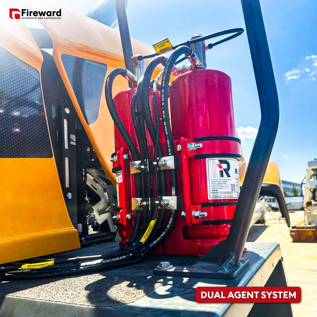 Dual agent fire suppression system fitted to a wheel loader