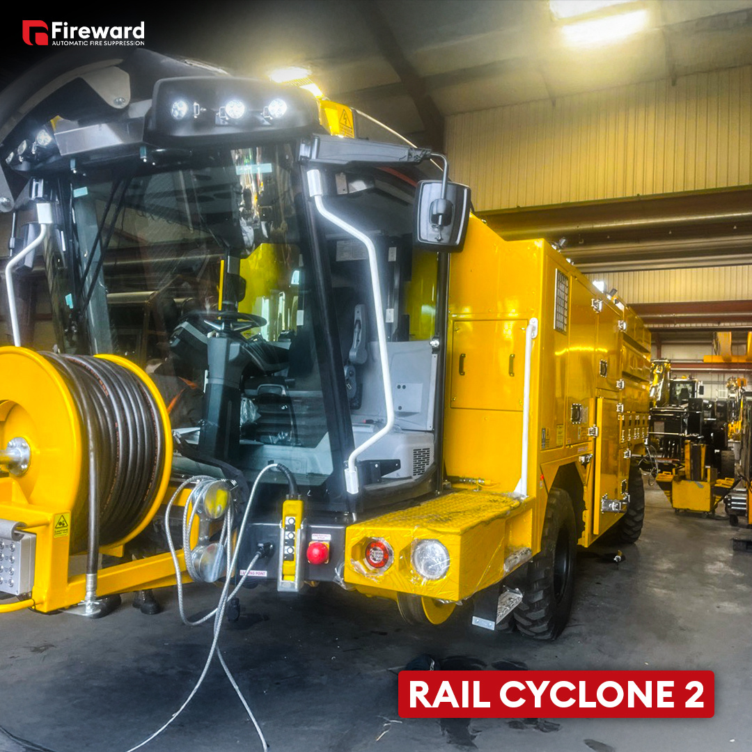A rail jet-vac vehicle fitted with automatic fire suppression
