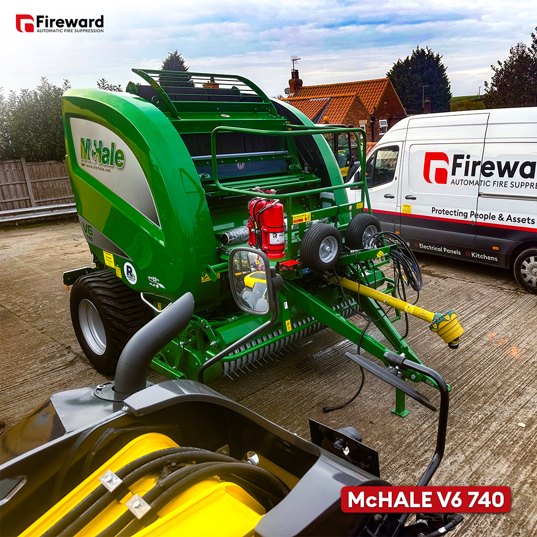 McHale V6 740 round baler with fire suppression system installed